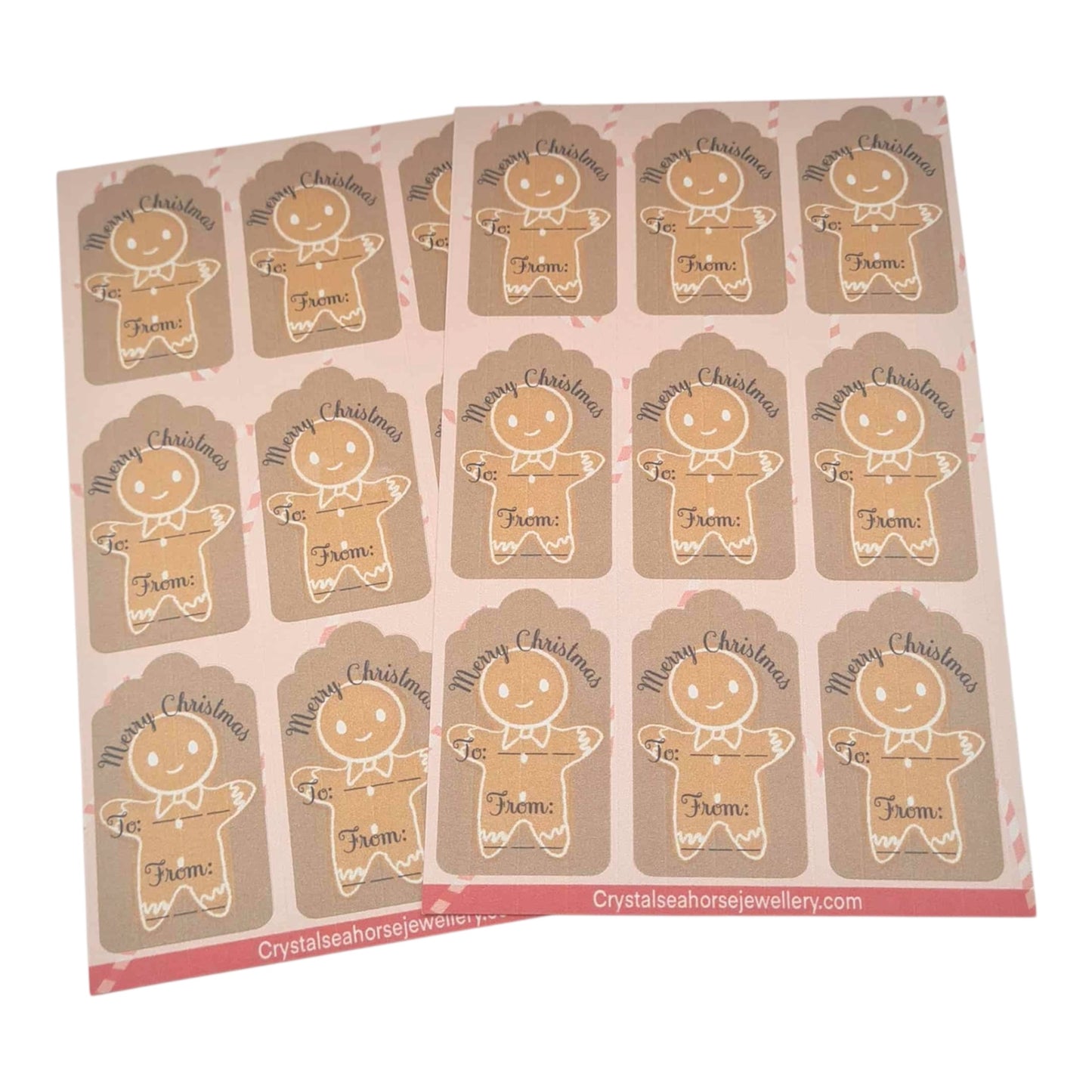 Sheet of Christmas-themed gingerbread man gift tags with 'Merry Christmas' text.