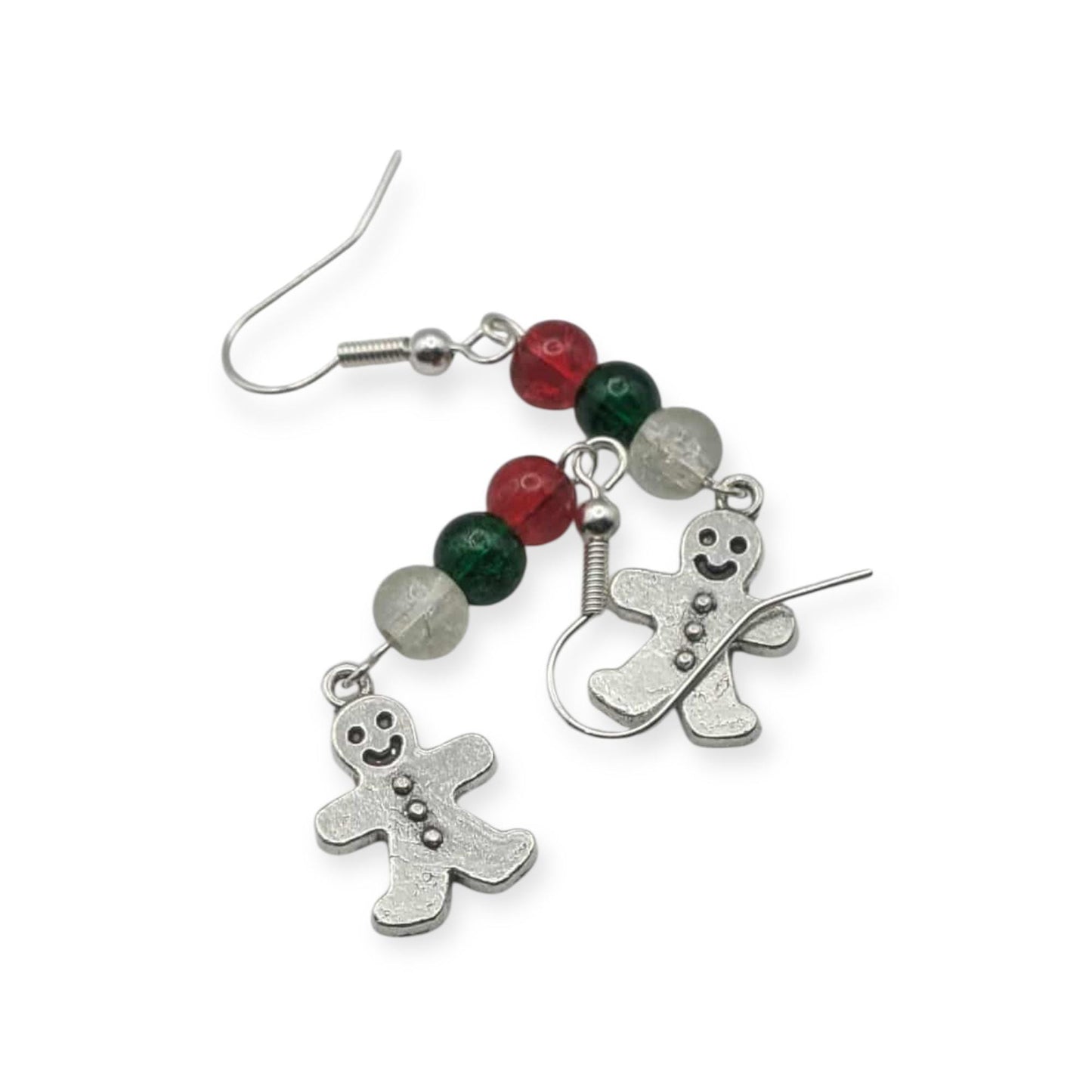 Gingerbread man earrings with red and green beads on a white background