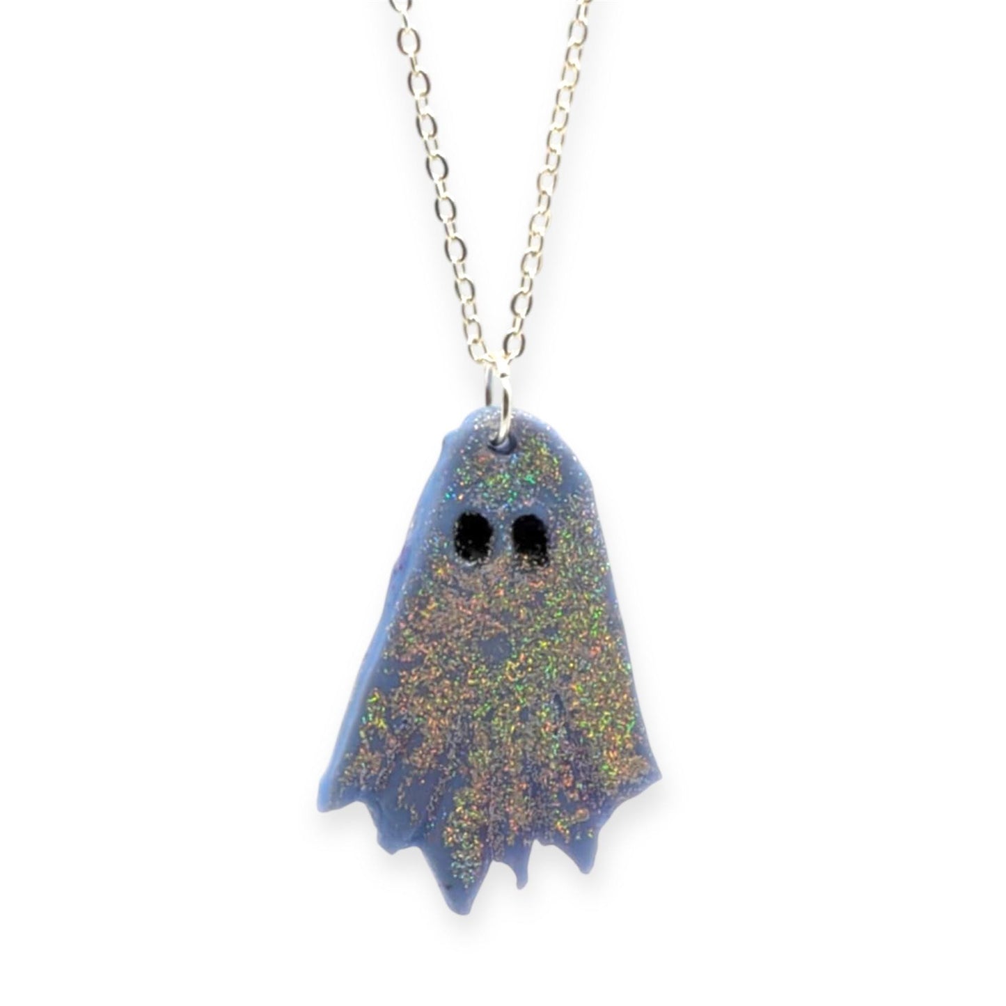 Ghost-shaped pendant on a chain against a white background