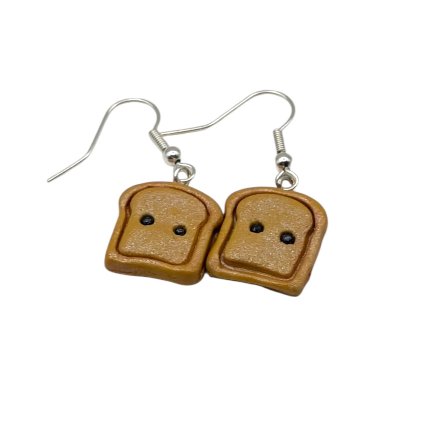 Sliced bread earrings toast charms on a white background