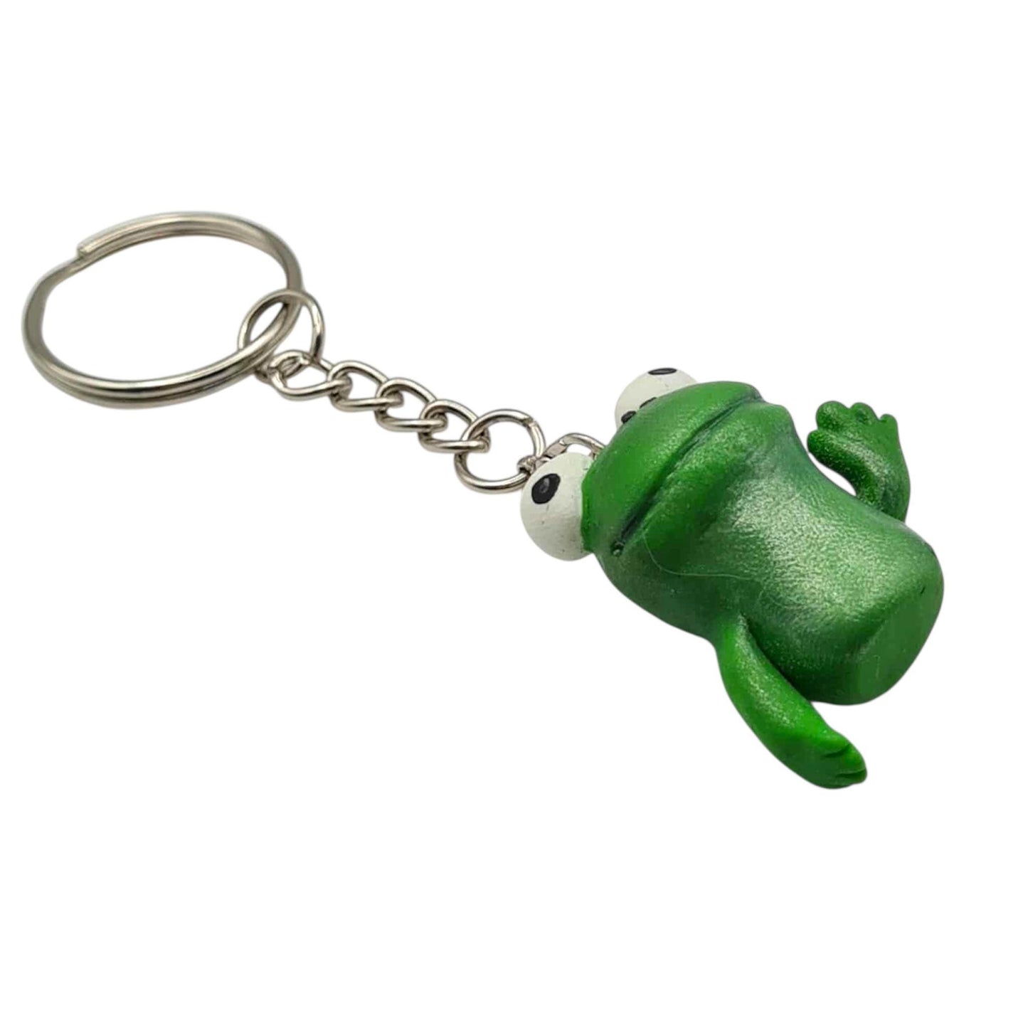 Green frog-shaped keychain on a white background