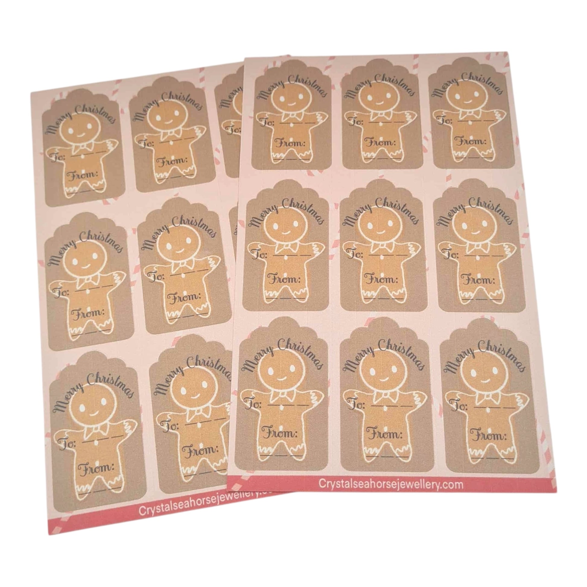 Sheet of Christmas-themed gingerbread man gift tags with 'Merry Christmas' text.