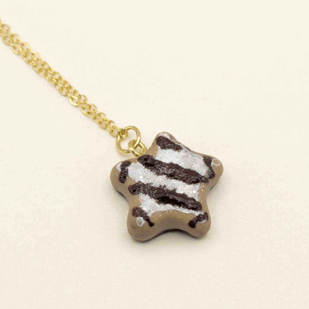 Miniature Lebkuchen Star Cookie Necklace on a gold plated chain, main product shot