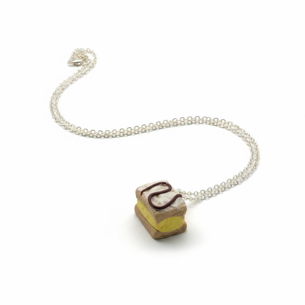 Rectangle custard slice necklace on silver chain on white background 
