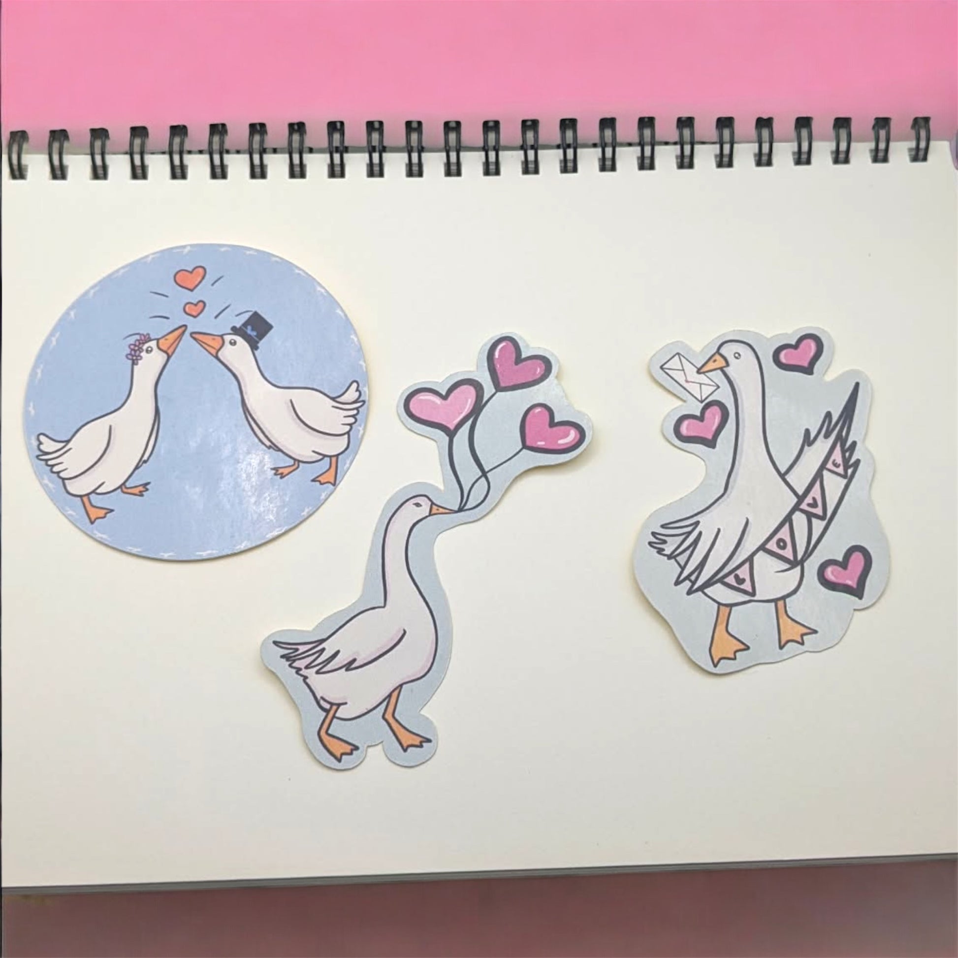 Goose stickers on notebook showing size and usage for Valentine's Day cards and journaling