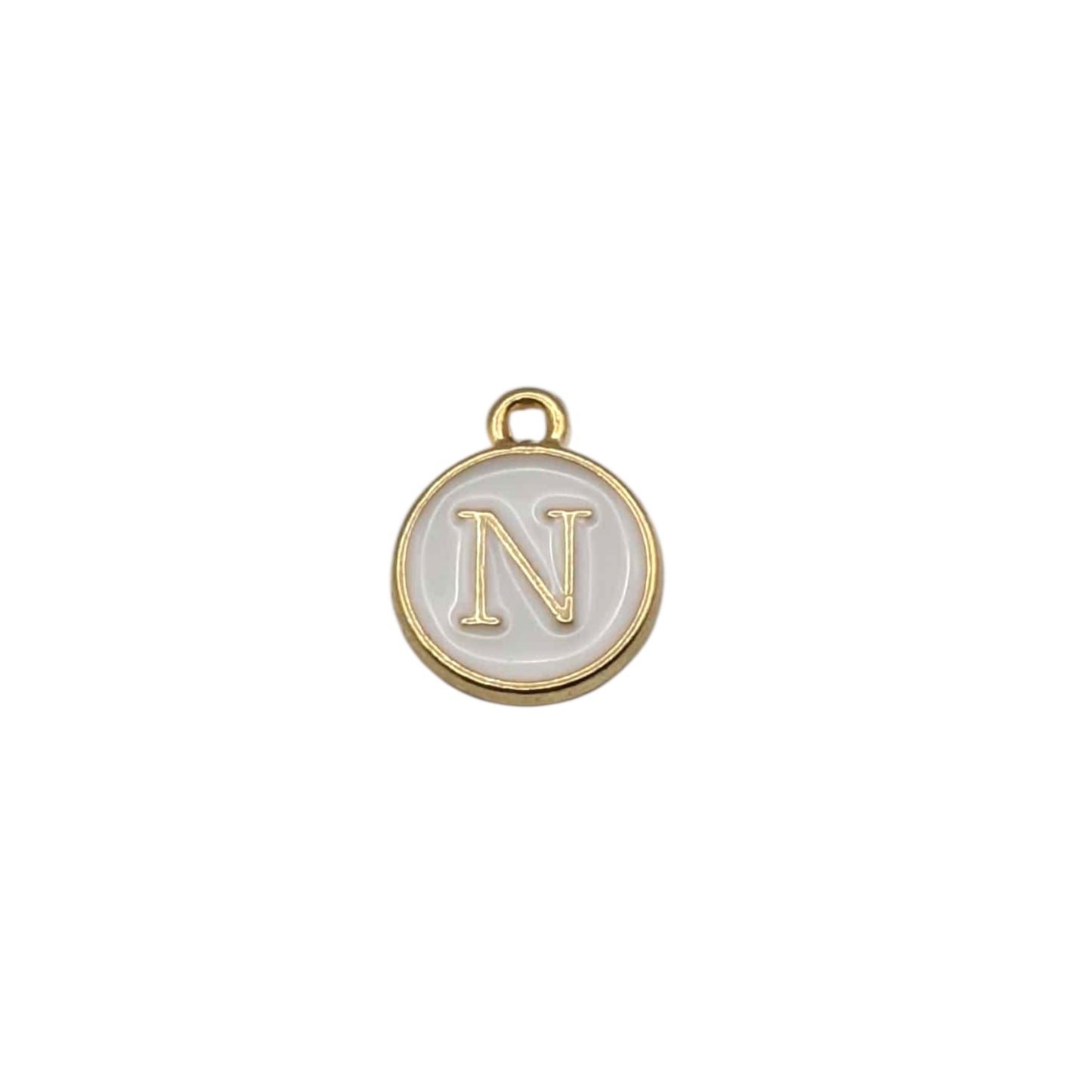 Gold pendant letter “ N “ on white background 