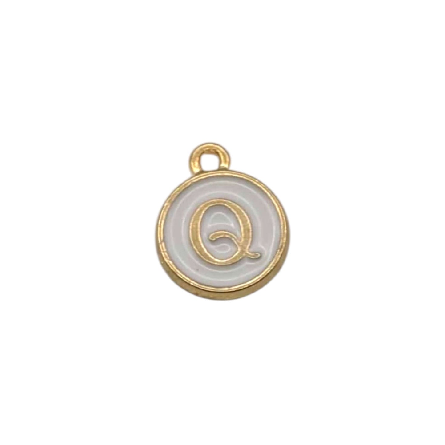Gold pendant letter “ Q “ on white background 