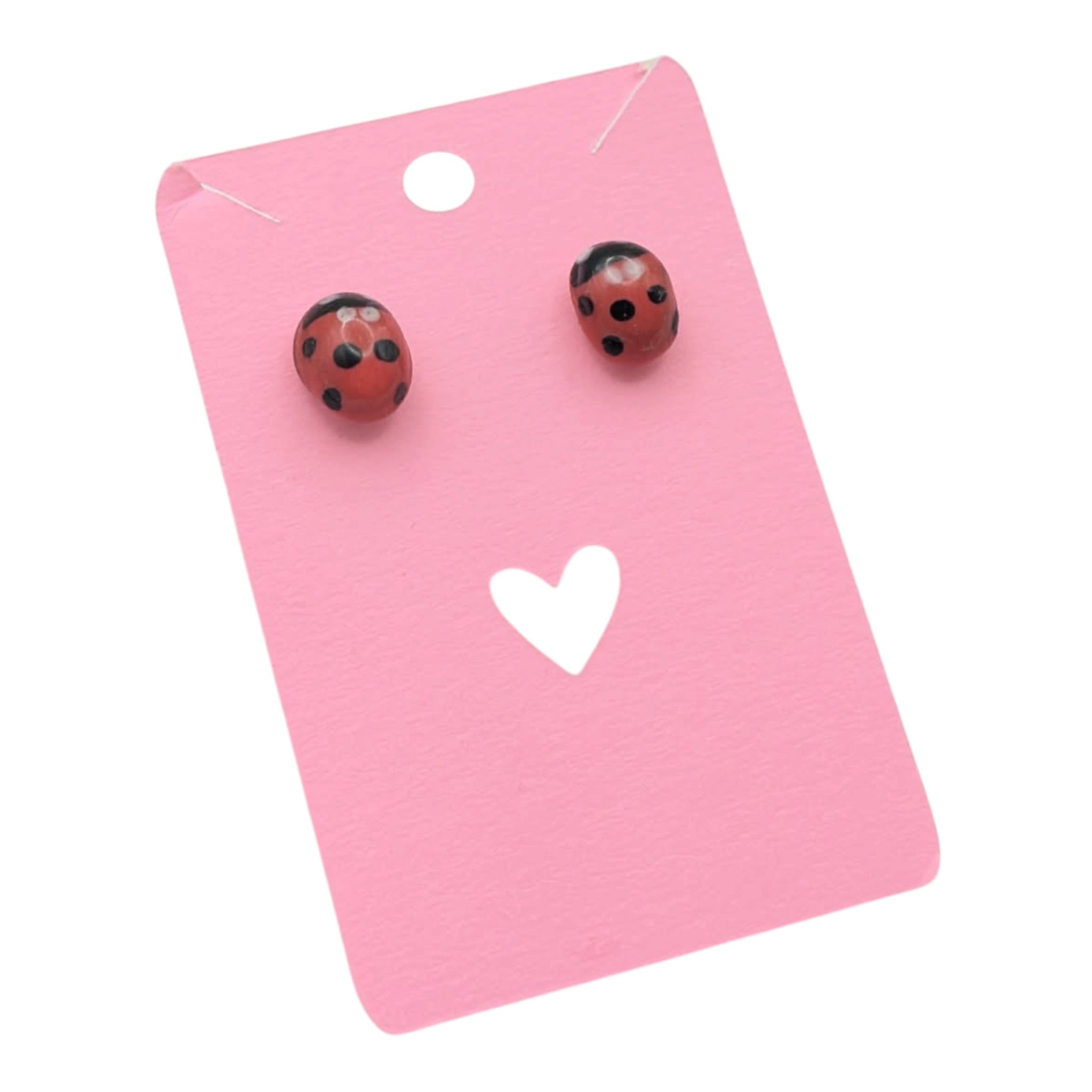 Ladybird stud earrings on pink heart earring card