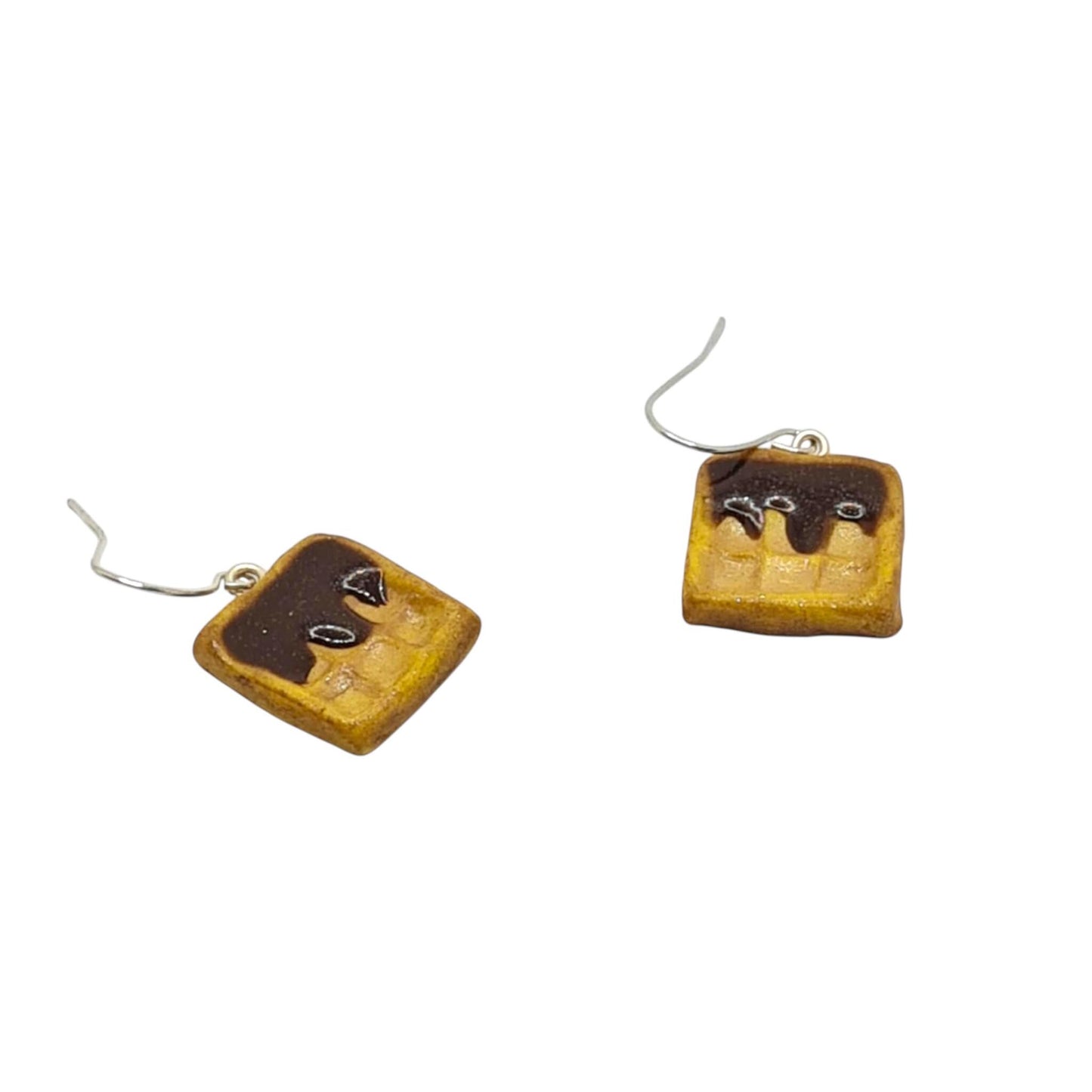 Square earrings with a brown top and yellow bottom on a white background