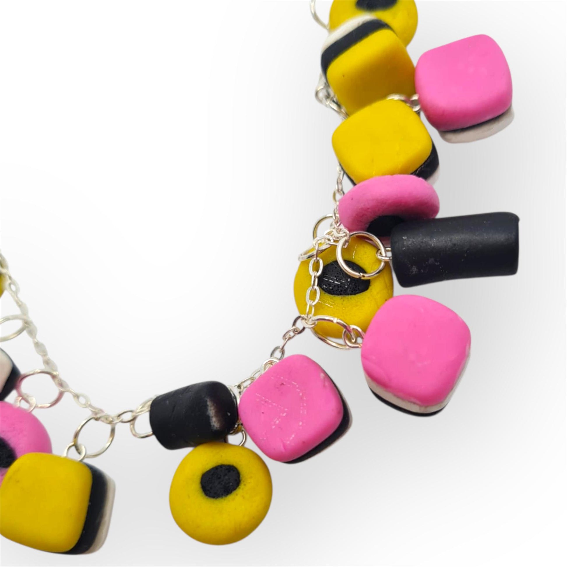 Bracelet with colourful beads on a white background