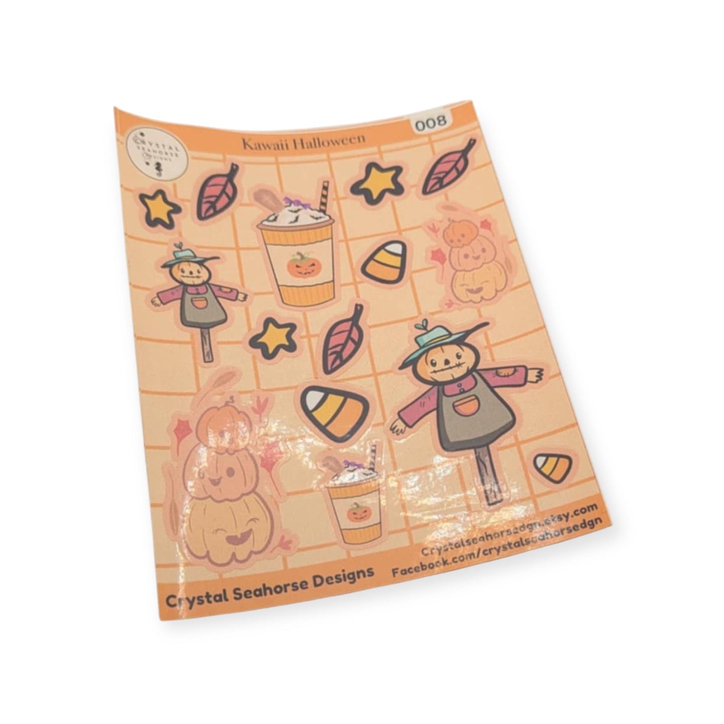 Sheet of Halloween-themed stickers with pumpkins, candy corn, and a ghost on an orange background.
