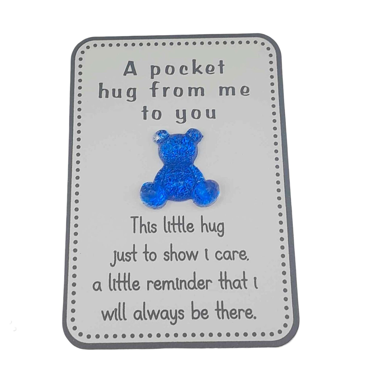 Blue teddy bear on a white card with text