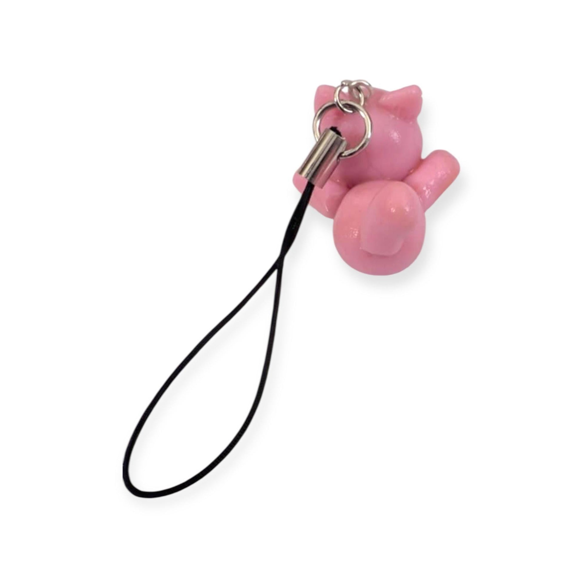 Pink cat-shaped phone charm with a black strap on a white background
