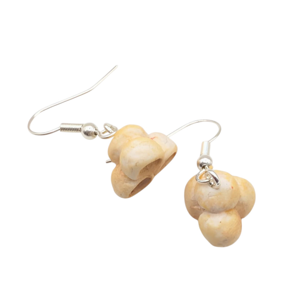 Handmade popcorn earrings crafted from polymer clay, showcasing a unique circus jewellery design.