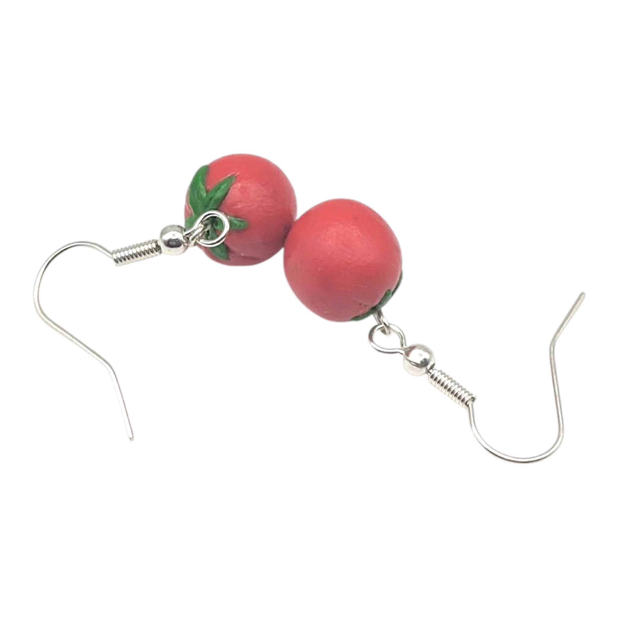 Handmade tomato polymer clay earrings product shot on white background