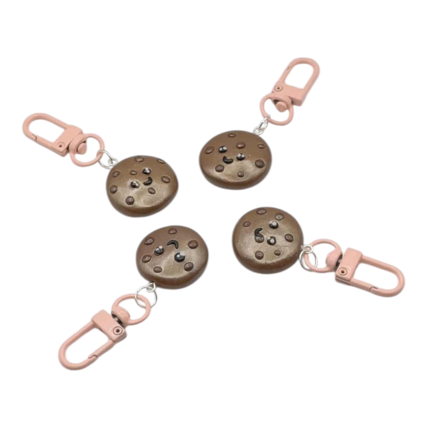 keychain pink clip with brown cookies on a white background