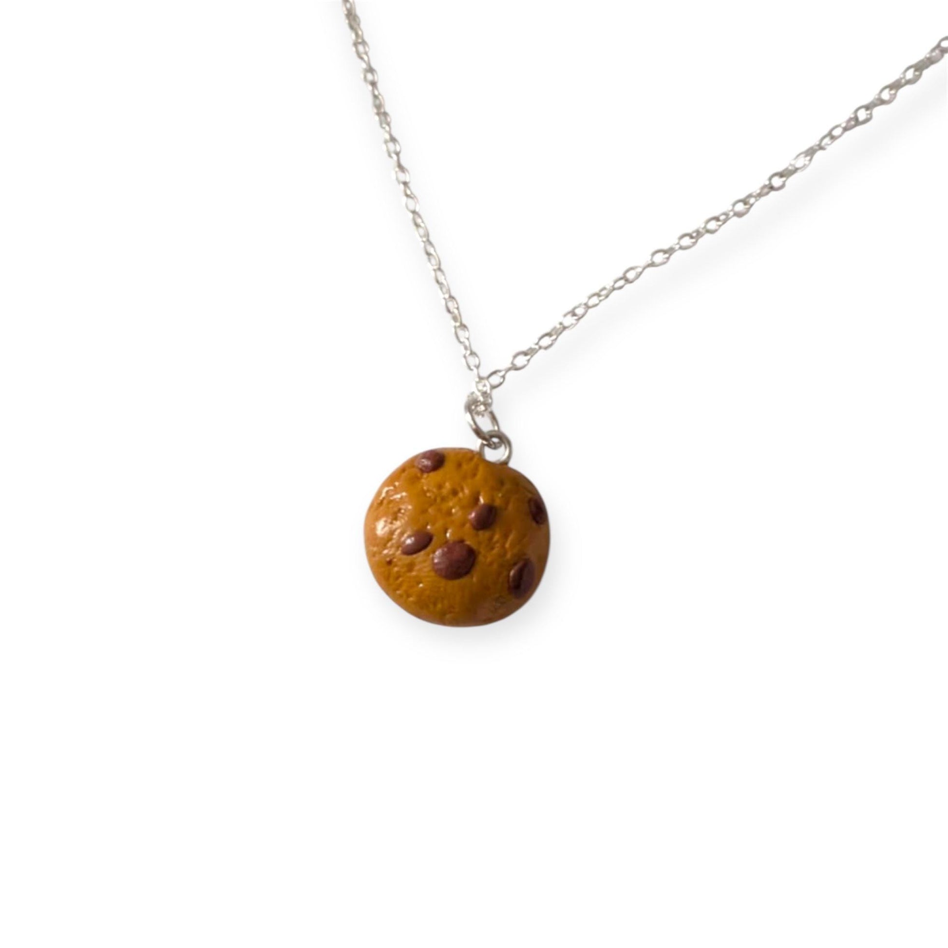 Necklace with a cookie-shaped pendant on a white background