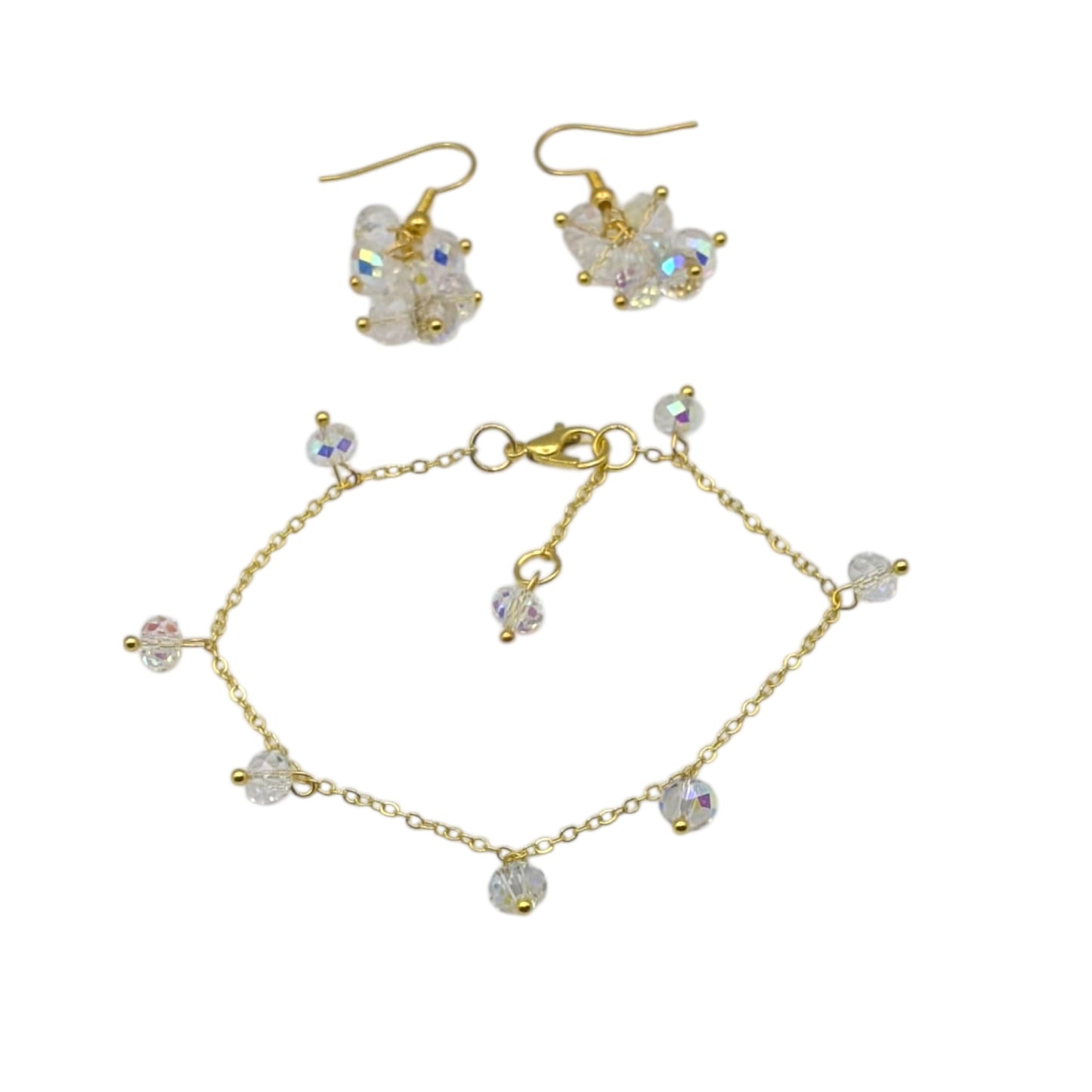 Cluster earrings and simple gold bracket on white background 