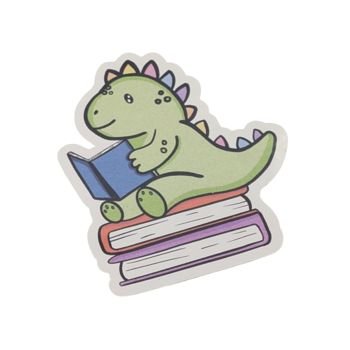 Green Dinosaur reading book with rainbow  spikes cute sticker on white background 