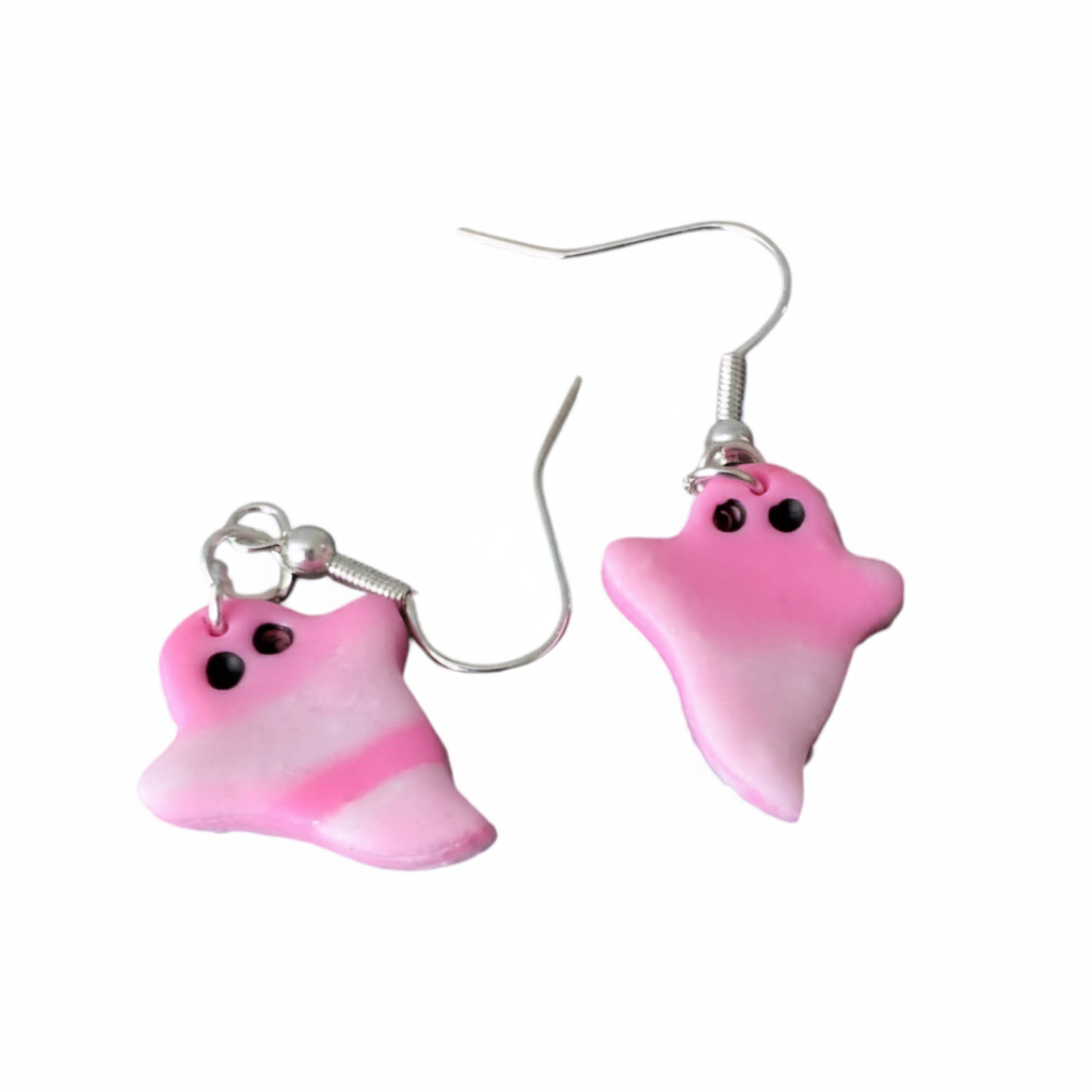 Pink ghost-shaped earrings on a white background