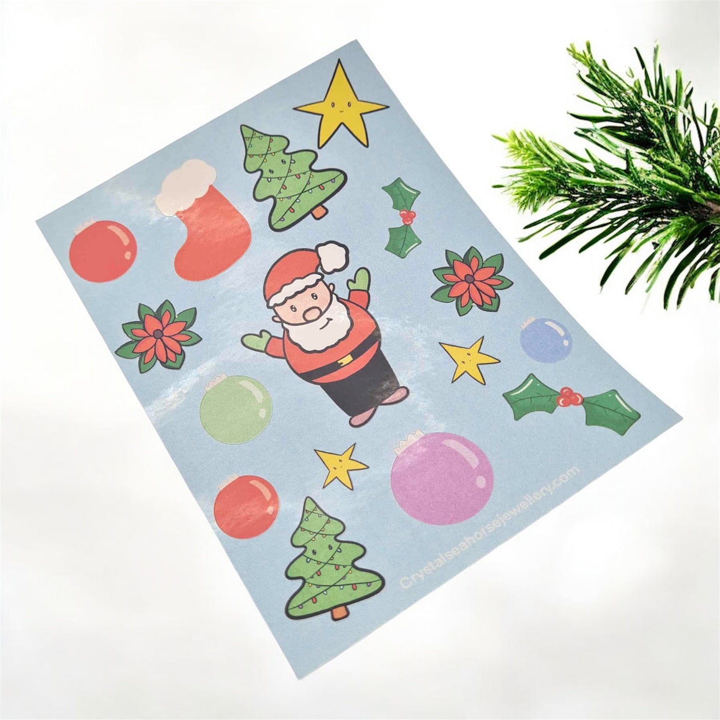 Cute holiday Christmas sticker sheet on a white background with Christmas leaves 