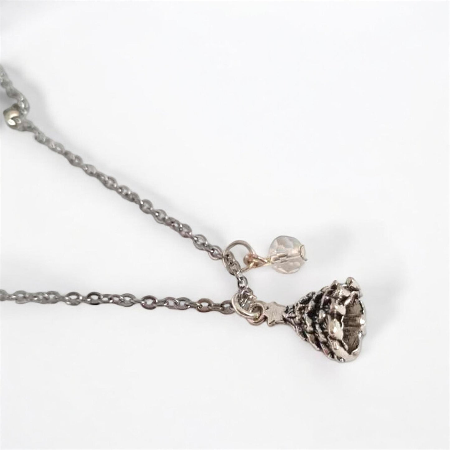Necklace with a small pendant on a white background