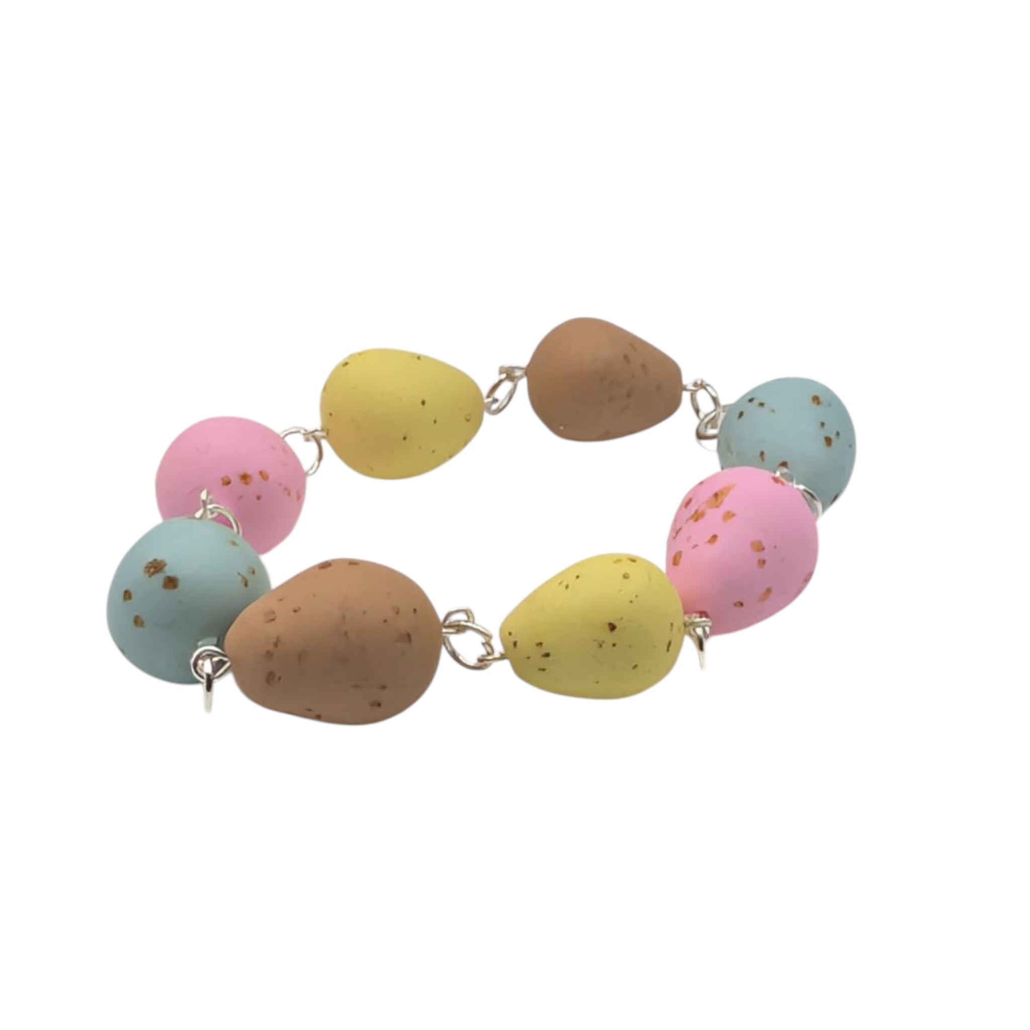Faux chocolate egg bracelet on white background 