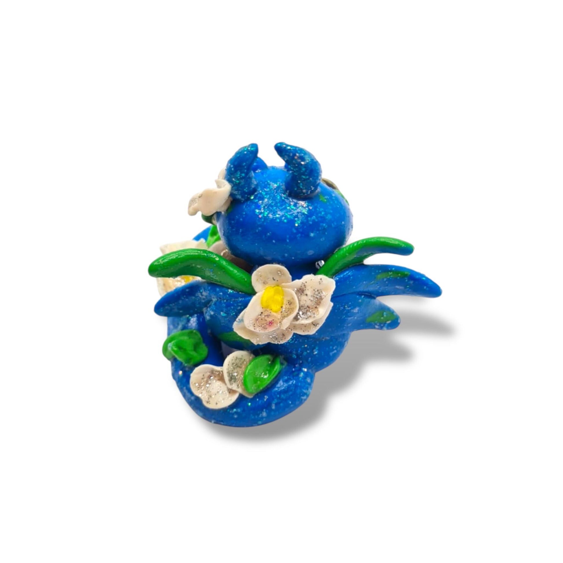 Blue ornament with floral design on a white background