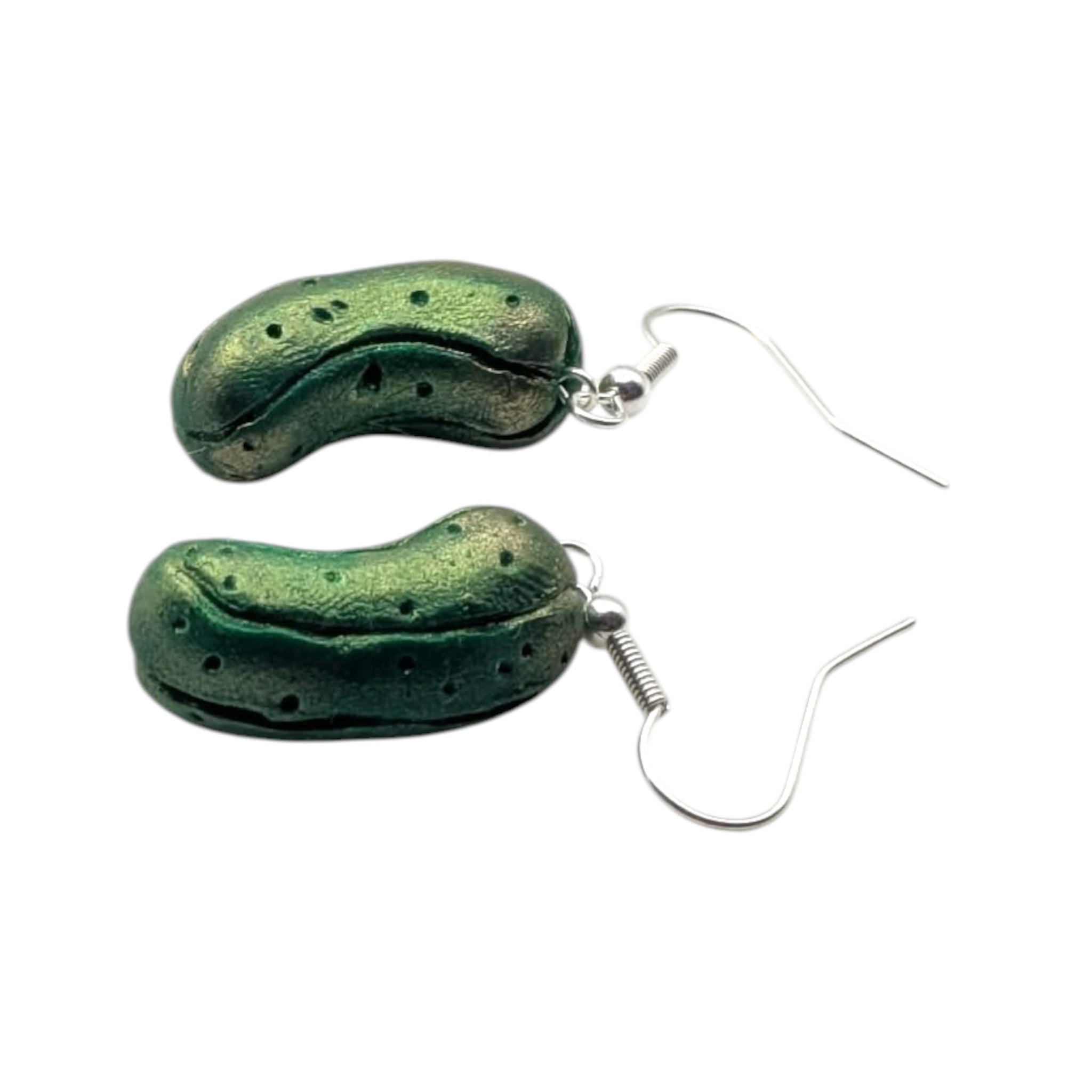 Polymer clay pickle-shaped drop earrings on a white background, handmade food jewellery UK