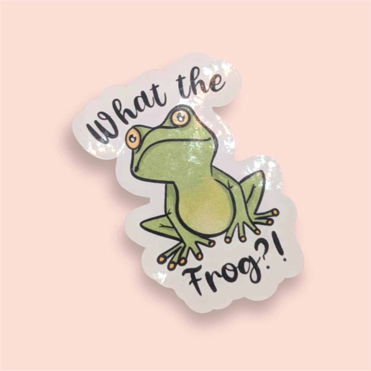 Sticker with a frog illustration and text 'What the Frog?' on a pink background