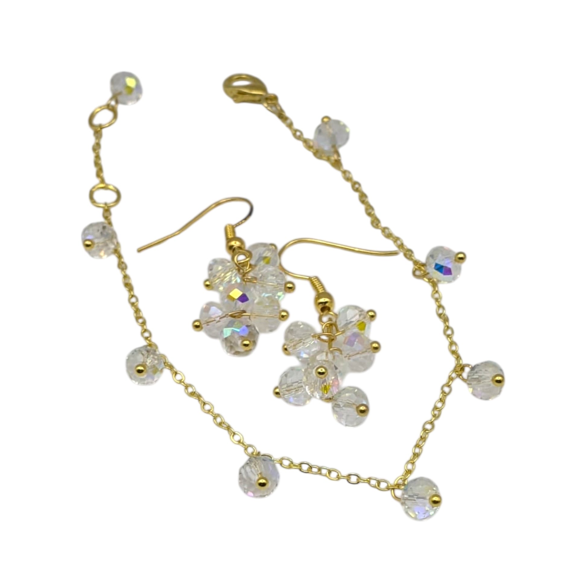 Gold plated crystal bridesmaids jewellery set on white background 