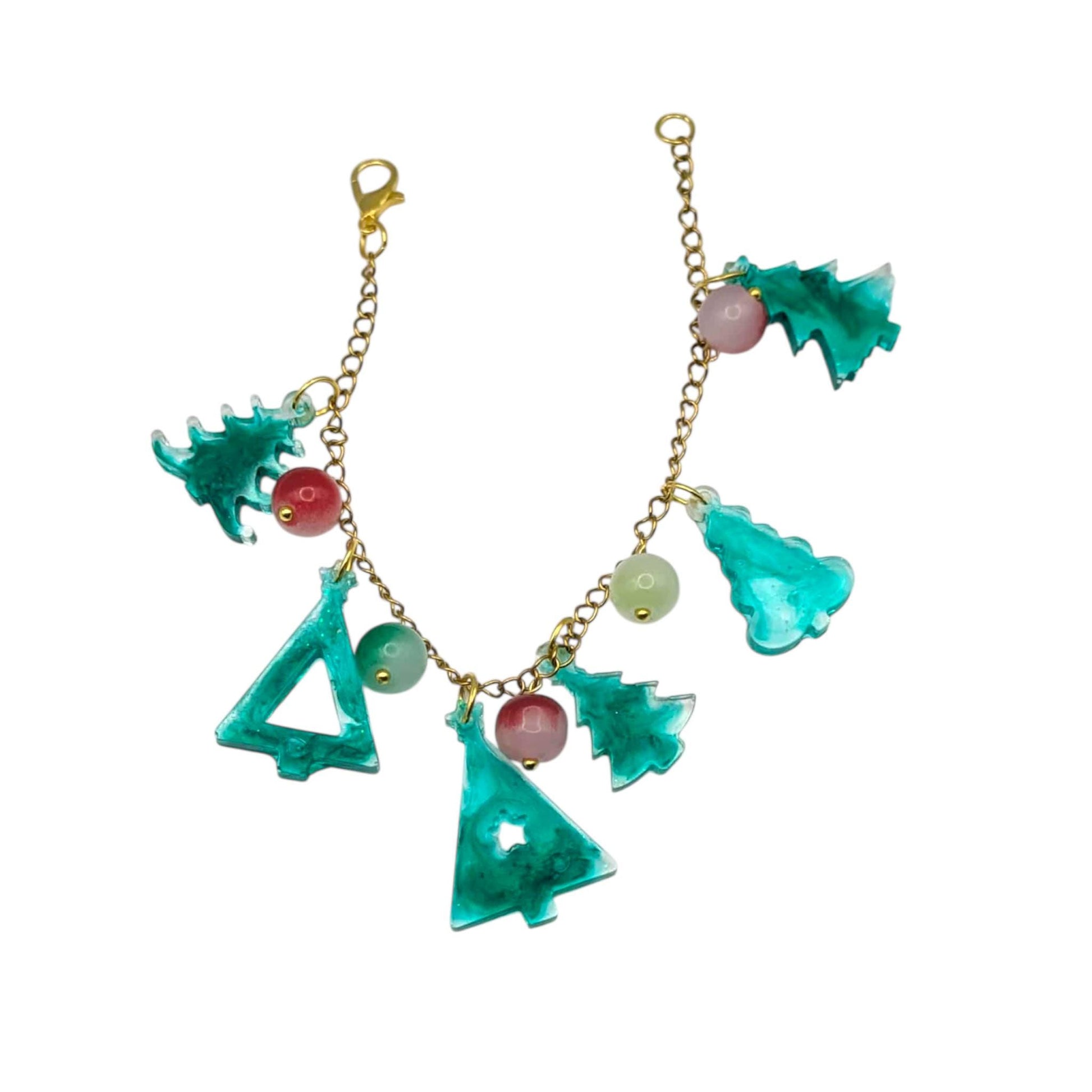 Gold chain with green tree-shaped charms on a white background 