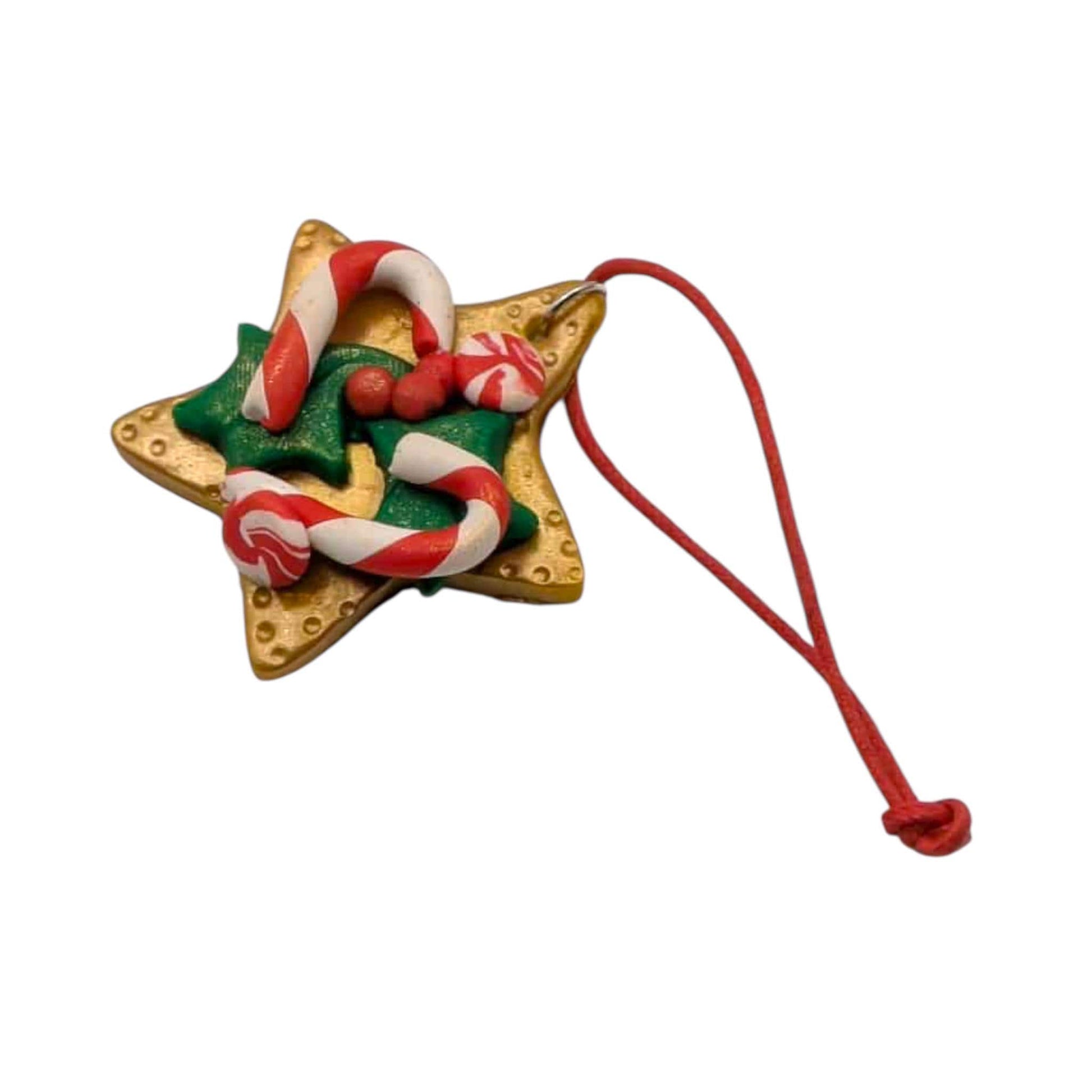 Star-shaped Christmas ornament with candy cane design on a white background