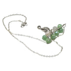 Silver chain seahorse necklace handmade jewellery on white background 