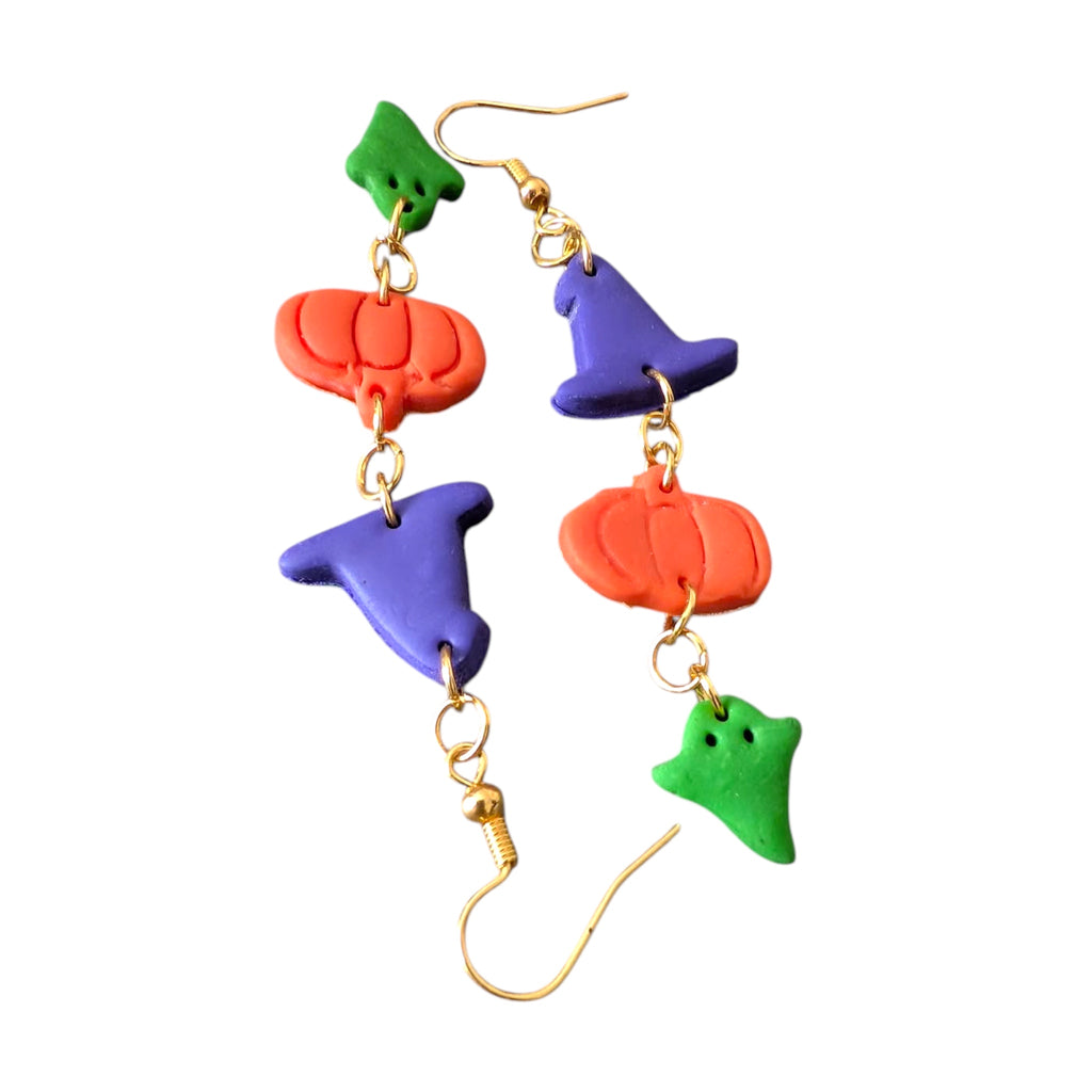 Colorful Halloween-themed earrings on a white background