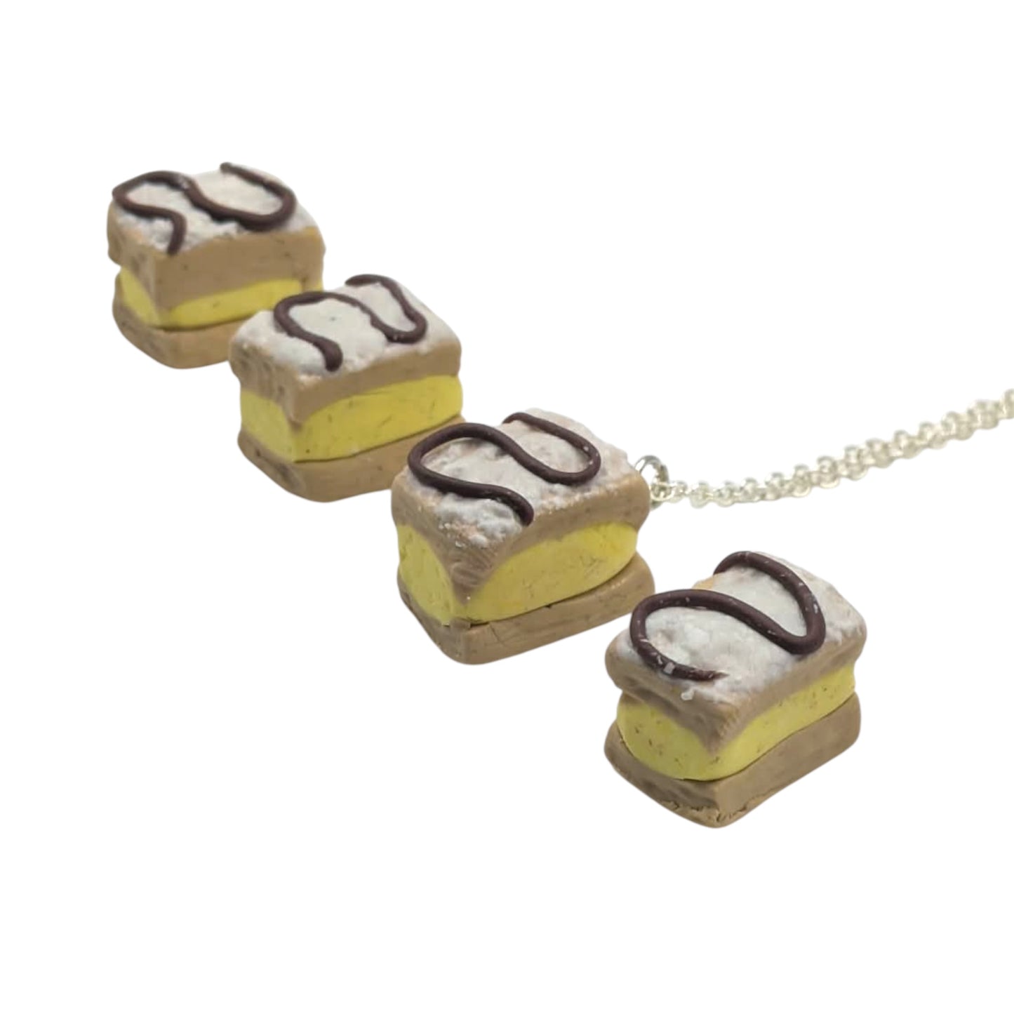 Miniature dessert necklace  on a white background