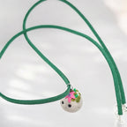Mossy rock Cottagecore necklace on white background 