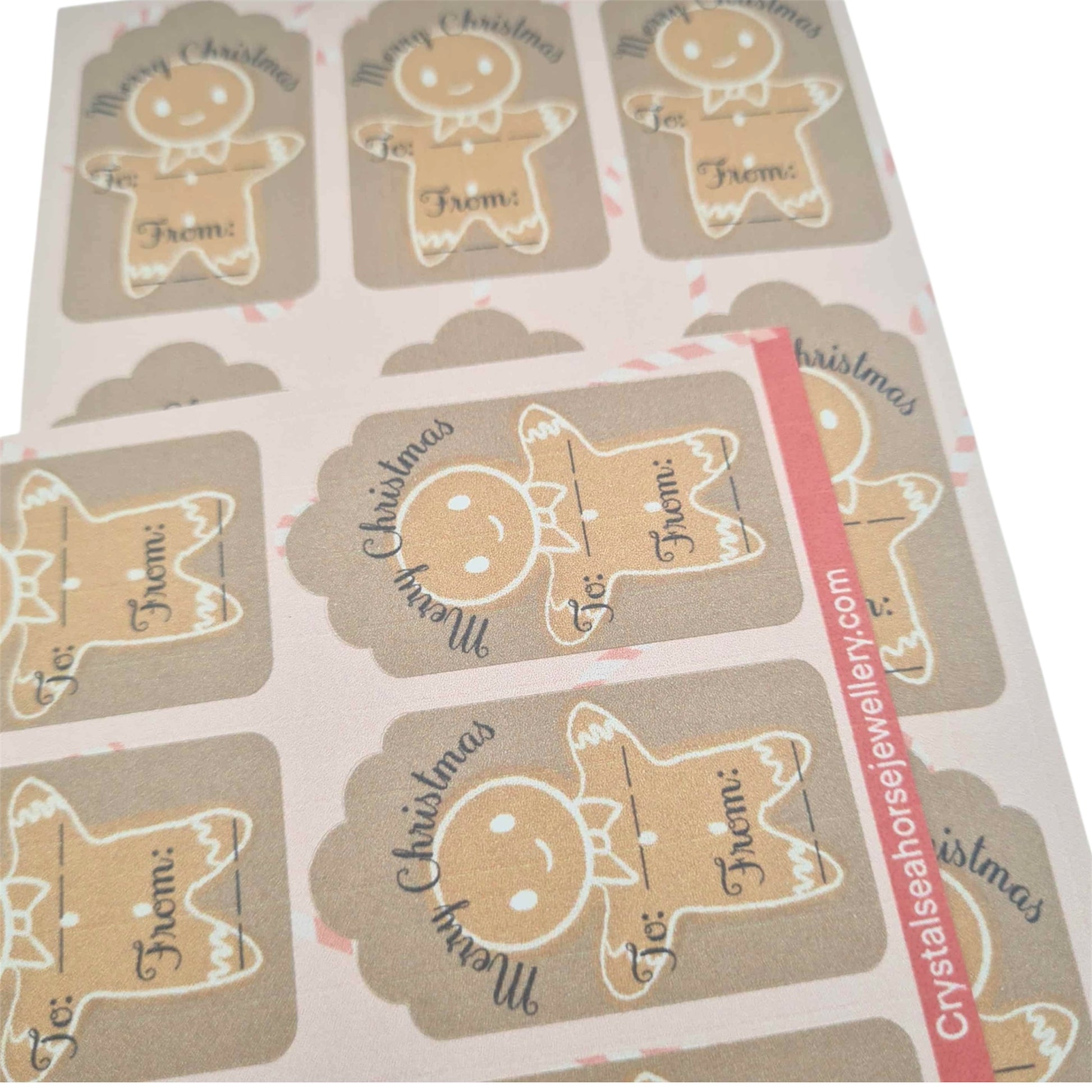 Sheet of Christmas-themed labels with gingerbread men design on a white background