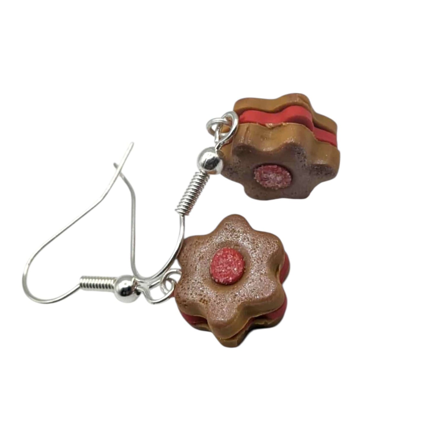 Pair of cookie-shaped earrings on a white background