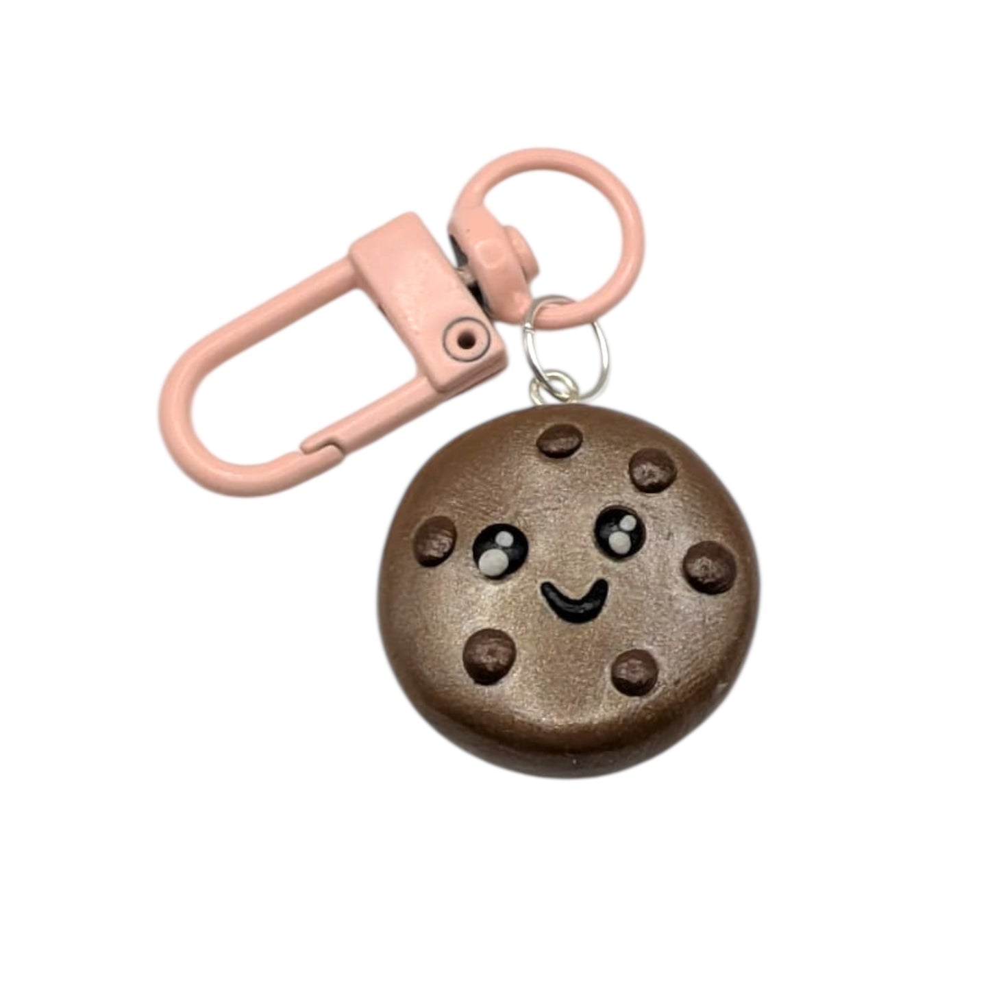 Cookie-shaped keychain with a pink clip on a white background