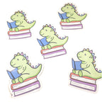 Dinosaur stickers flat lay on white background 