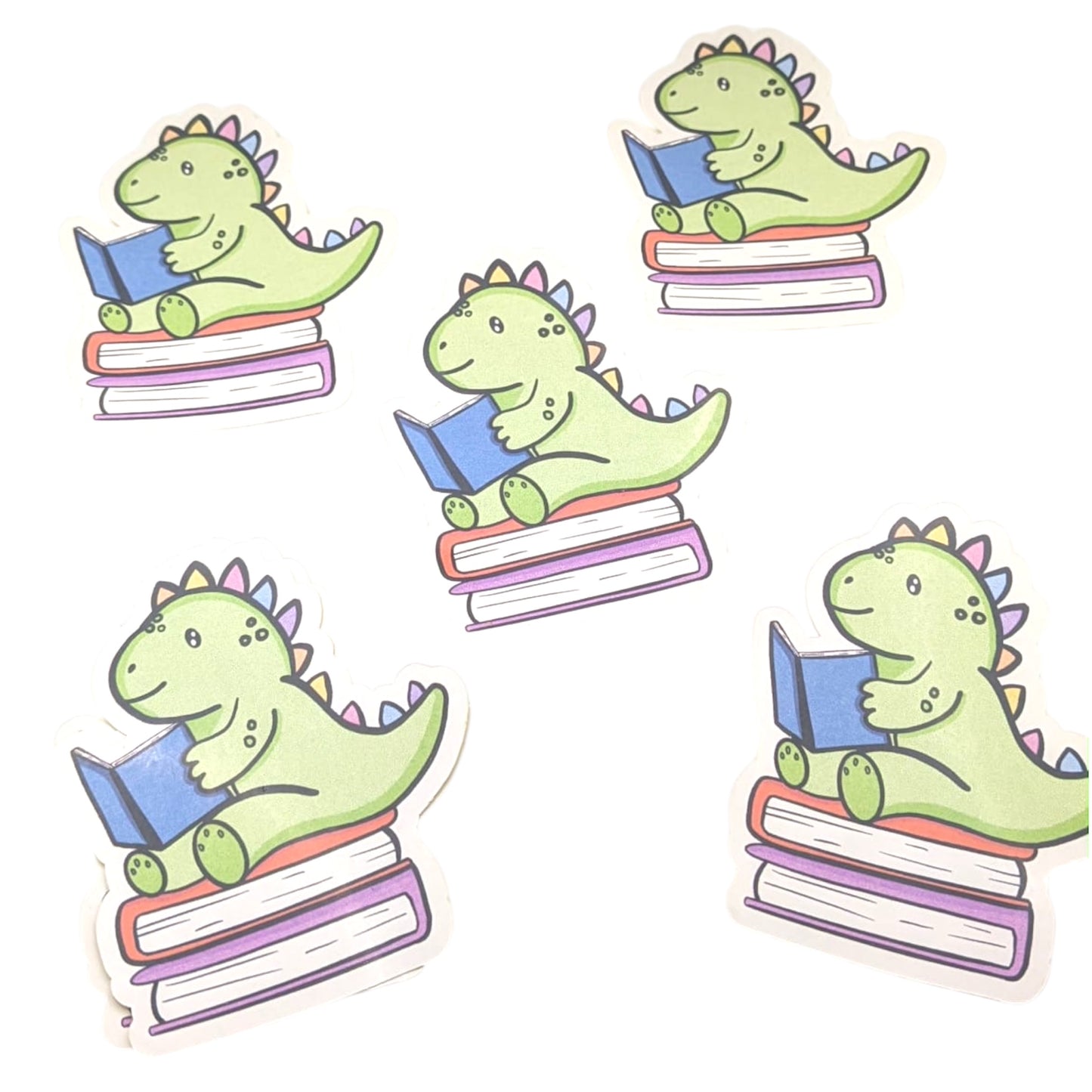 Dinosaur stickers flat lay on white background 