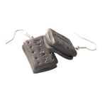 Kawaii miniature bourbon biscuit earrings close up shot showing bourbon text and food like texture 