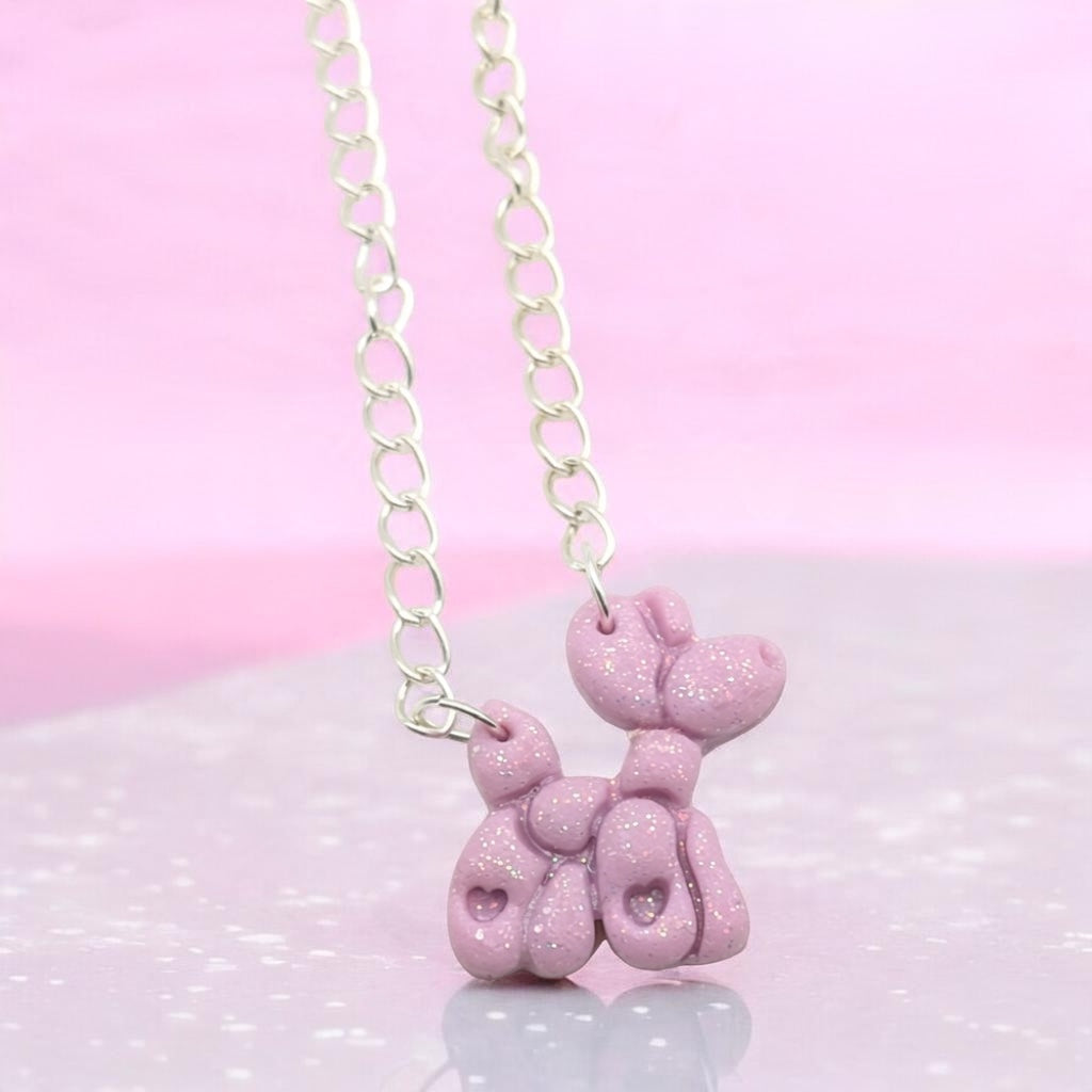 Lilac balloon dog necklace with heart-shaped leg details