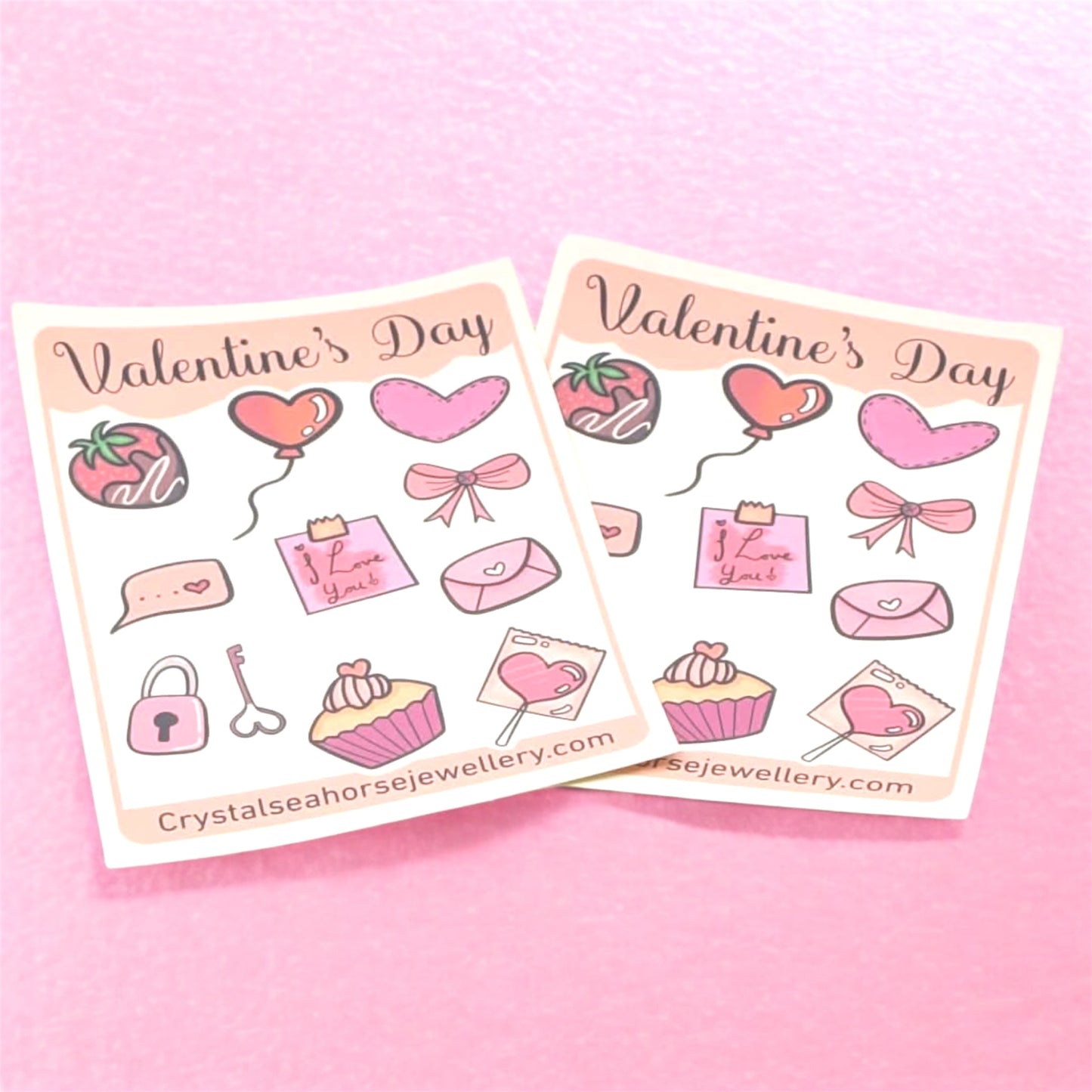 Two sheets of Valentine's Day-themed stickers on a pink background