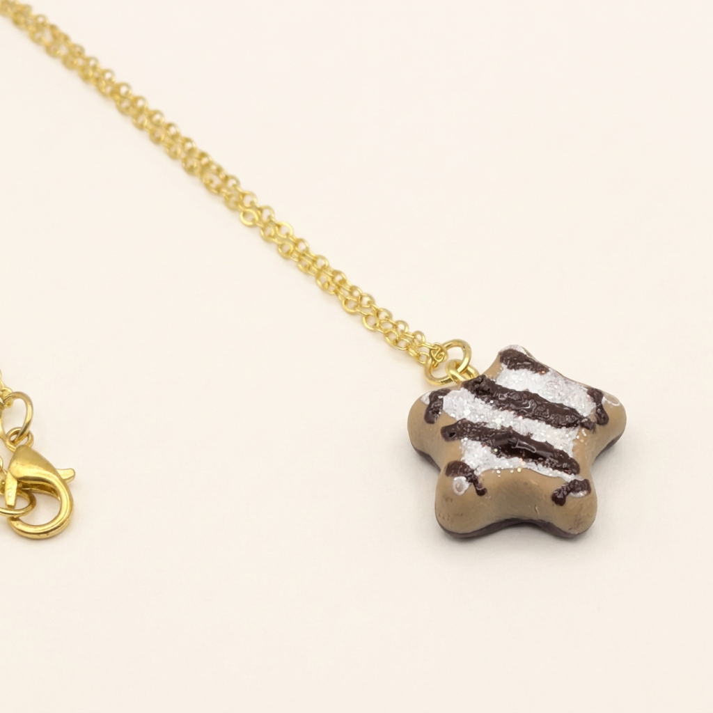 Miniature Lebkuchen Star Cookie Necklace showing sparkling sugar-style detail
