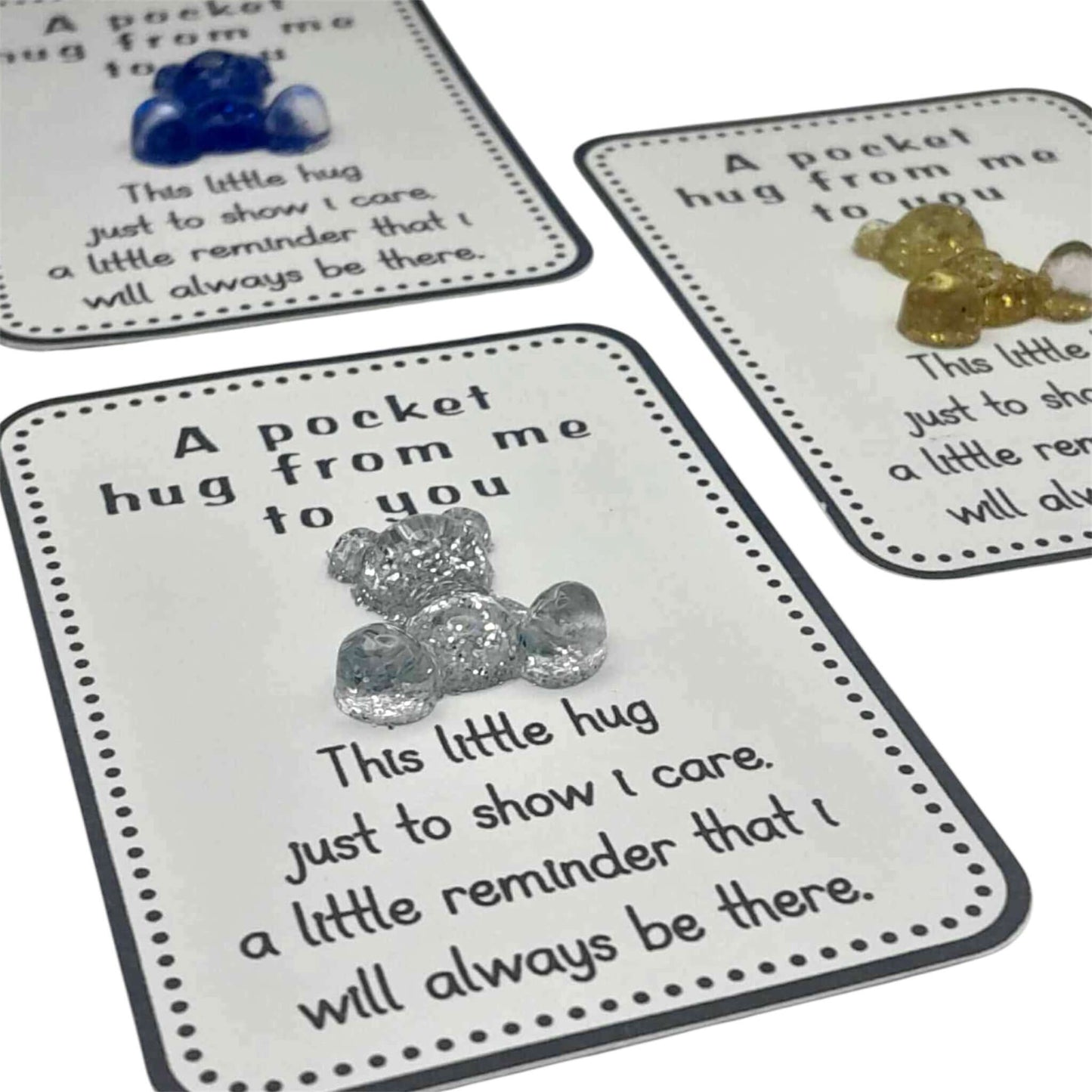 Three cards with glittery teddy bears and sentimental text on a white background