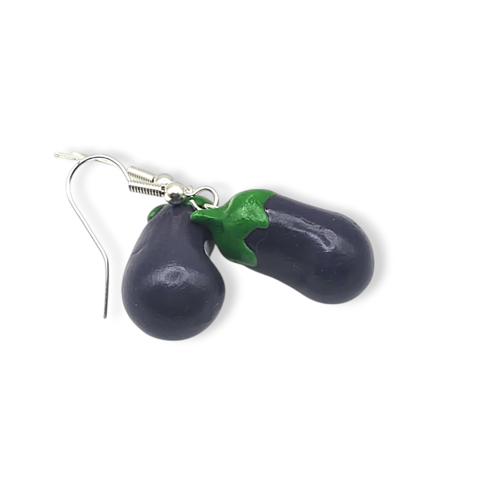 Aubergine shaped earrings with green stems on a white background
