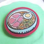 Colorful illustration of a bowl of ramen on a green background