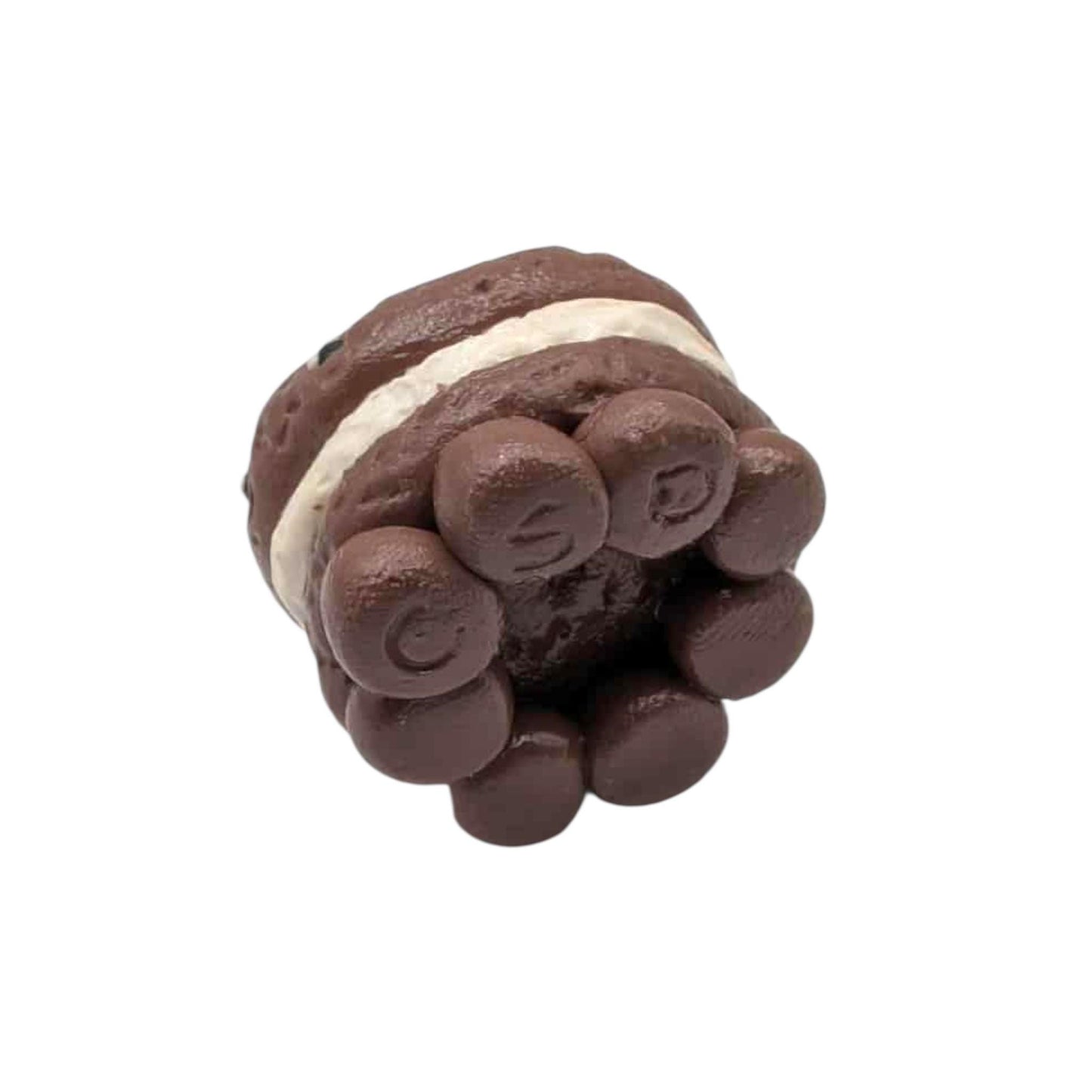 Chocolate cookie with white cream filling on a white background